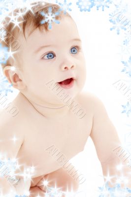 portrait of crawling baby boy looking up