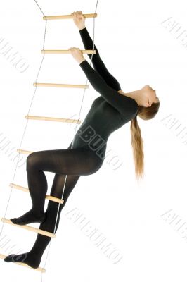 Woman on a rope ladder