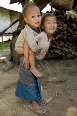 Hmong girl with brother, Laos