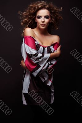 beautiful and sexy brunette girl on dark