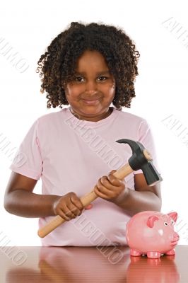 Happy girl with hammer and money box