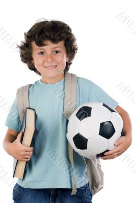 Student boy blond with a soccer ball