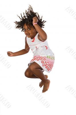 Adorable african girl jumping