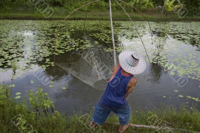 Fisherman with stave, Asia