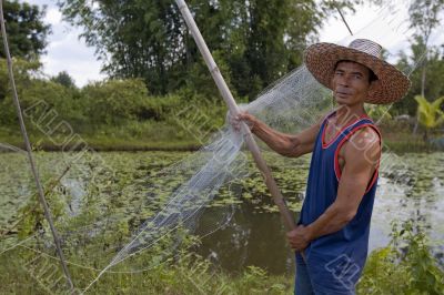 Fisherman with stave, Asia