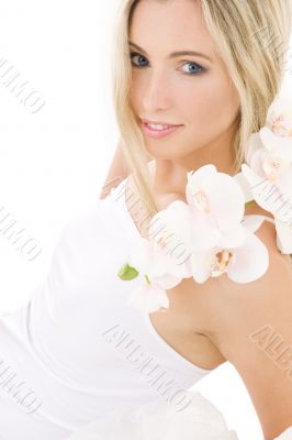 blonde in cotton underwear with orchid