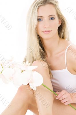 blonde in cotton underwear with orchid