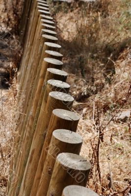 Poles in a fence