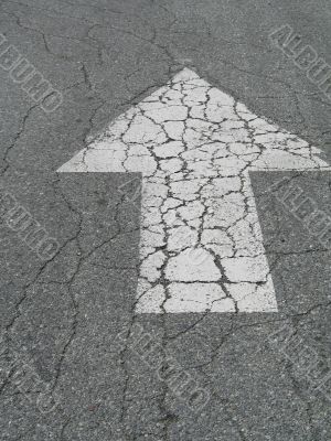 white arrow sign