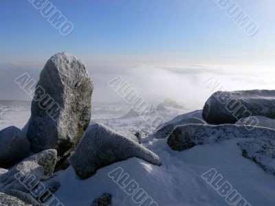 Sheregesh. Big stone on top of mountain.