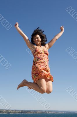 Beautiful girl jumping