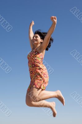 Beautiful girl jumping