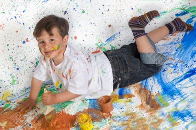 Boy playing with painting