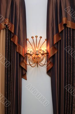 Portieres and floor lamp