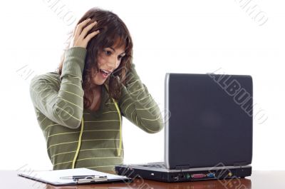 Beautiful surprised girl with laptop