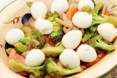 close up of broccoli with quail eggs