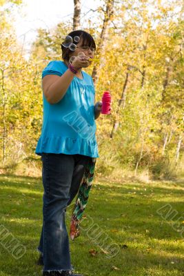 Child Blowing Bubbles