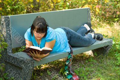 Girl Reading Outside