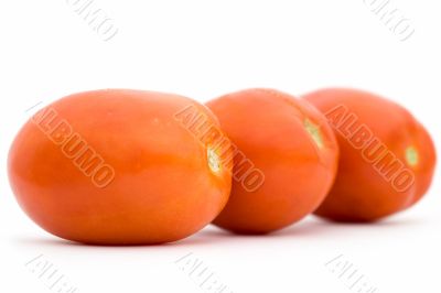 Three red tomatoes