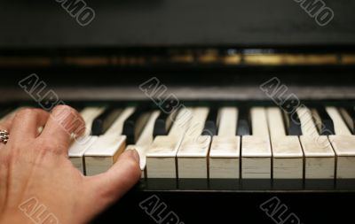 Piano and hand