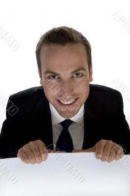 caucasian man holding white banner