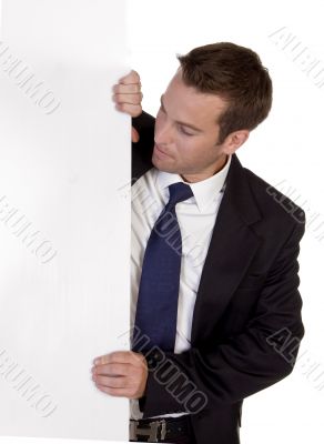 businessman standing with white board