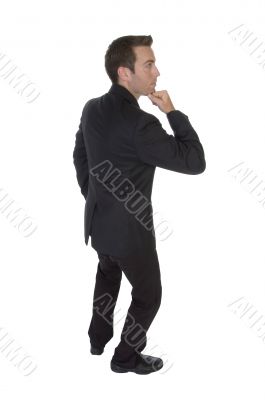 businessman with chin on hand