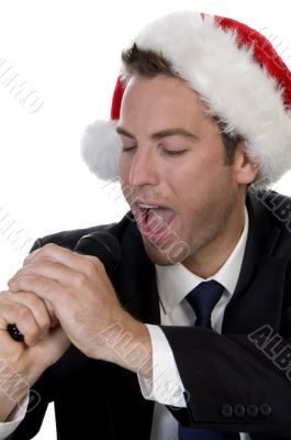 businessman singing into a microphone