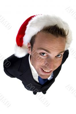 caucasian businessman with santa cap