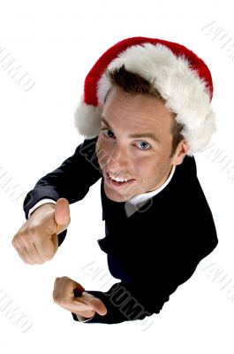 caucasian businessman with cheerup and santa cap