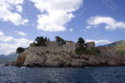 An island with a st.stefan church in montenegro