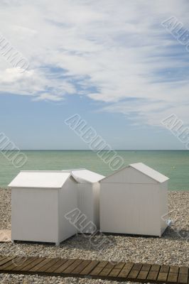 White beach cabins