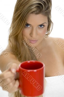 sexy female showing coffee mug