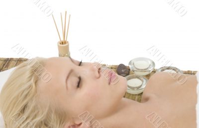 lady relaxing on massage mat