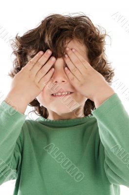 Boy with his hands covering the eyes