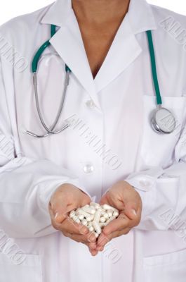 Doctor with pills in the hands