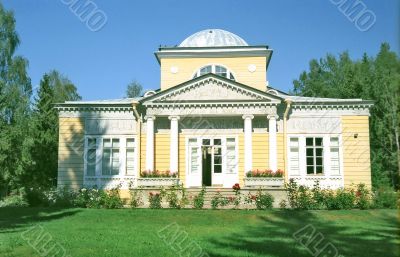 Classical wooden building in front