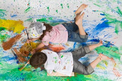 Friends playing with painting