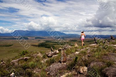 Tourist with tepui in background