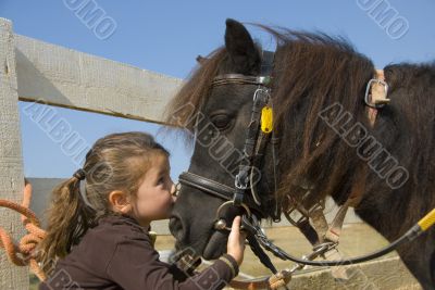 little girl and pony