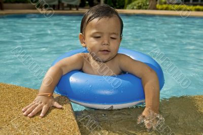 Baby with swimming tires