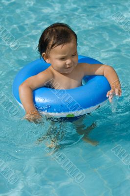 Baby with swimming tires