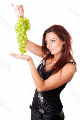 beautiful girl with green grapes