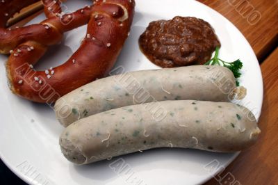 Typical Bavarian veal sausage with Pretzel