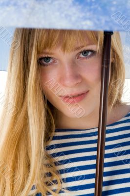 blond girl with umbrella