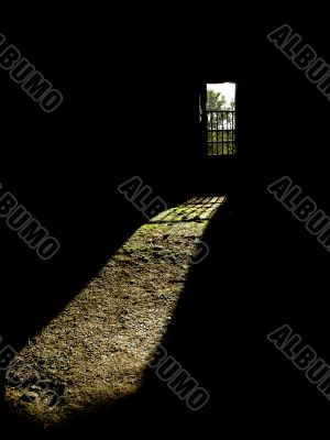 Shade from a window of a tower of the castle on a room floor
