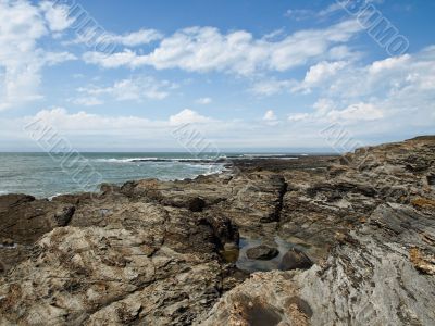 Kind from rocky high coast on ocean open spaces
