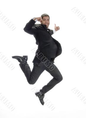 businessman leaps in air