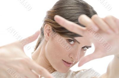 woman showing framing hand gesture