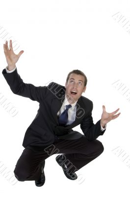 sitting businessman looking upward